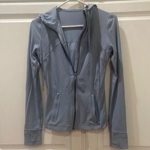 Light blue Lululemon jacket.